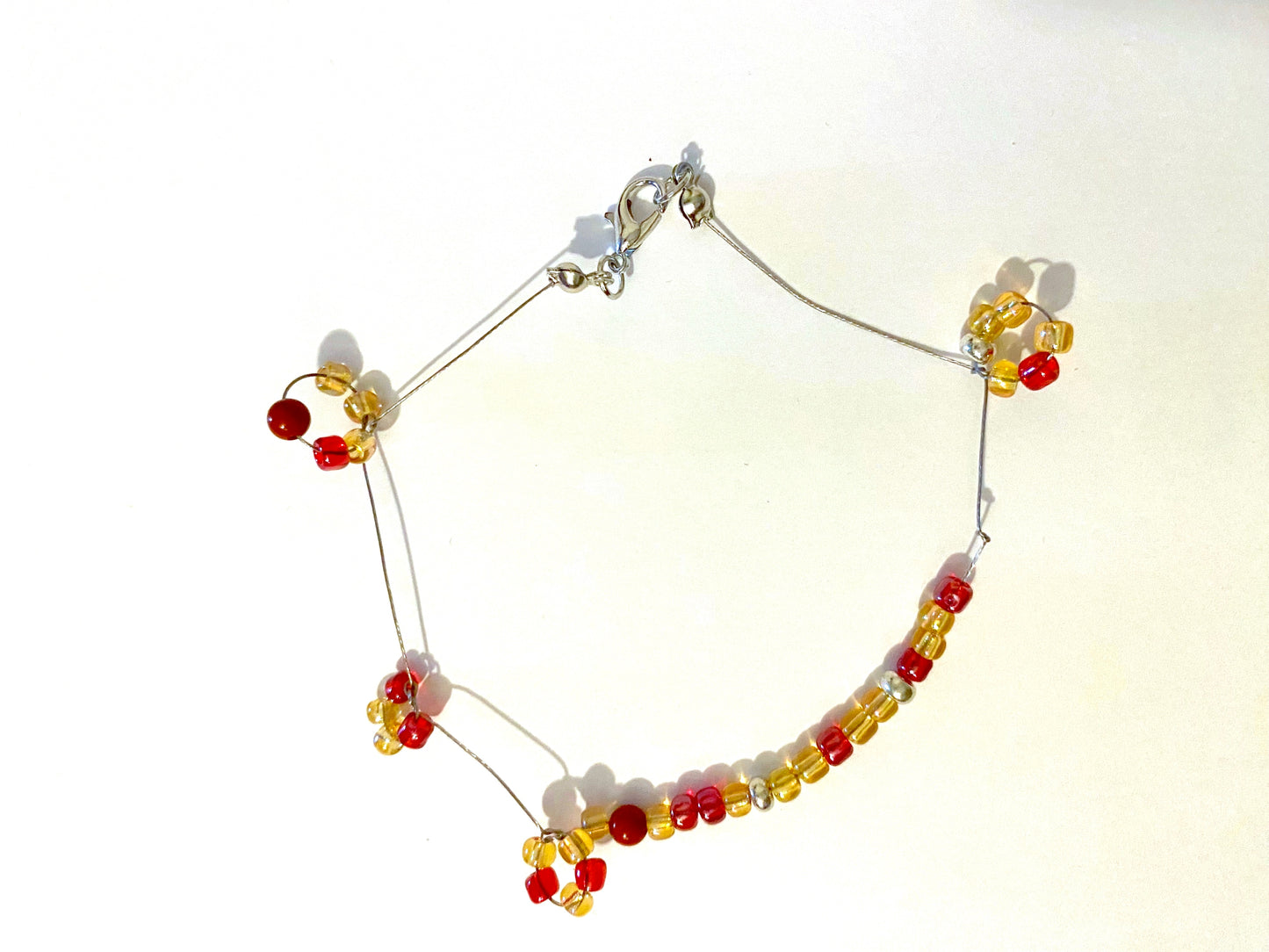 Pale Yellow Red Beaded Bracelet