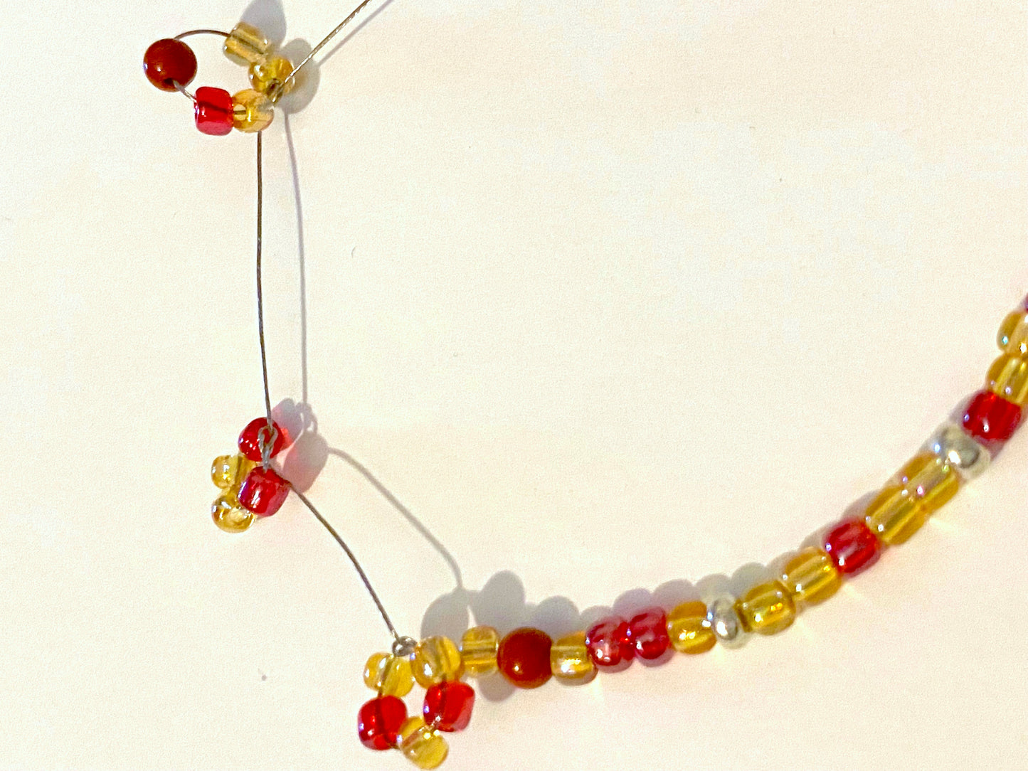 Pale Yellow Red Beaded Bracelet
