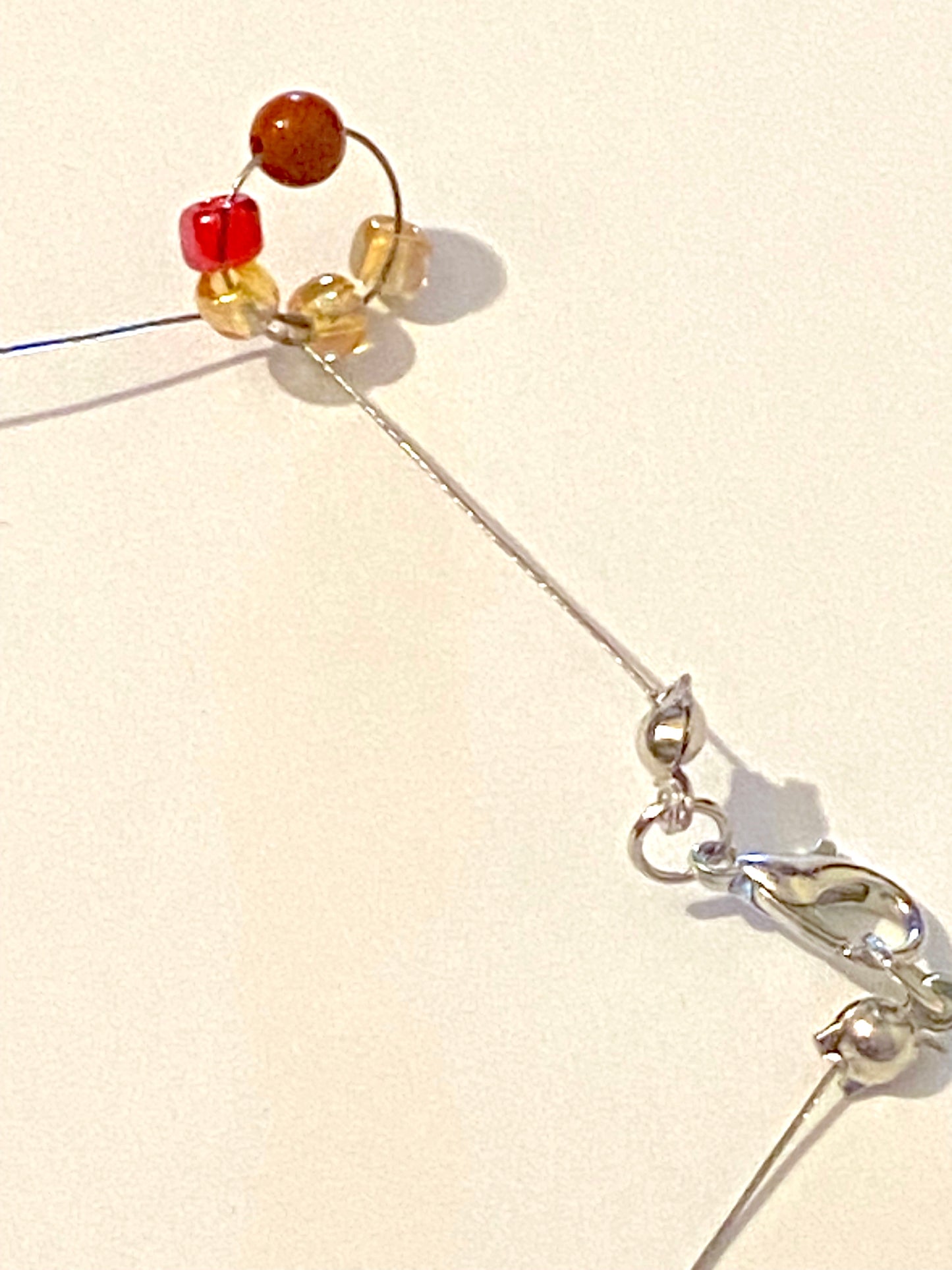 Pale Yellow Red Beaded Bracelet